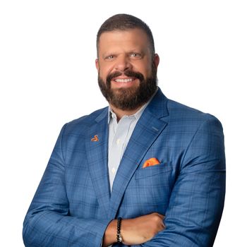 Portrait of John Tomljanovic, REALTOR®.